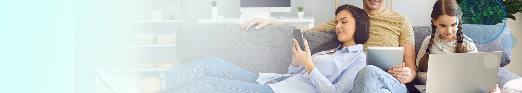 family on couch on devices with blue gradient